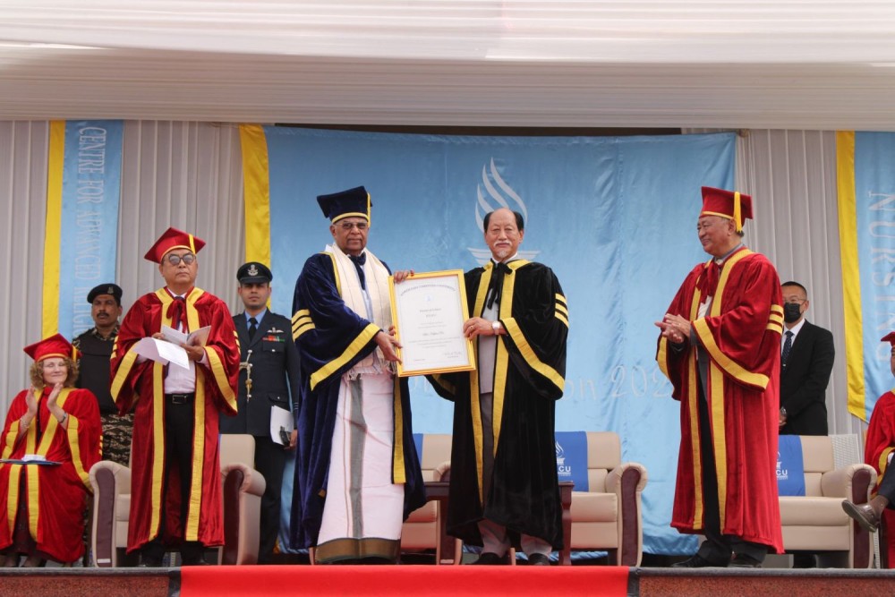 Nagaland Governor La Ganesan presenting the honourary Doctor of Letters, conferred by the North East Christian University, Dimapur, to the Chief Minister, Neiphiu Rio at the university’s first convocation, on February 25. (Morung Photo)